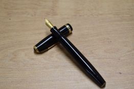 A Parker Duofold button fill fountain pen in Black with broad decorative cap band having Parker