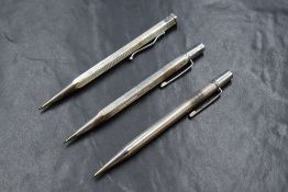 Three Yard o Led mechanical pencils. Two Hallmarked Silver 1955 and 1966, maker Johnson, Matthey &
