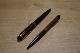 A Wahl Eversharp Skyline lever fill fountain pen and pencil set in Brown stripe with single cap band