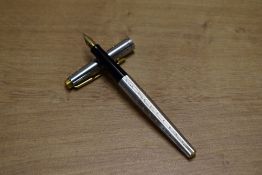 A Parker 35 Cartridge fill fountain pen in Silver Perle with gold trim