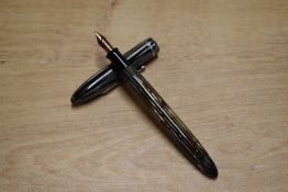 A Sheaffer Lifetime Junior piston fill fountain pen in Pearl and Black with single cap band having