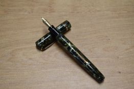 A Mabie Todd & Co Swan lever fill fountain pen in Green Marble with single cap band having Swan