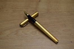 A boxed Parker Premier converter fill fountain pen in Gold Plate having Parker 750 France nib