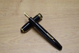 A Conway Stewart 58 lever fill fountain pen in Black with one broad and two narrow cap bands