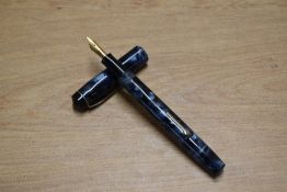 A Conway Stewart 466 Universal in Blue Pearl and Black Marble having Conway Stewart 14CT Gold nib.