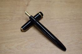 A Parker Duofold aerometric fill fountain pen in Black with single decorative cap band having Parker