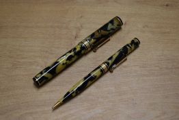 A Wahl Oversized lever fill fountain pen and propelling pencil in Pearl and Black with broad deco