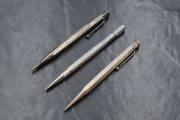 Three hexagonal Yard o Led mechanical pencils. Two Sterling Silver with wave engine turning