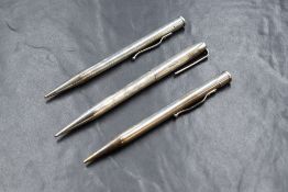 Three Yard o Led mechanical pencils. One plain round Sterling Silver (some dents). Two hallmarked