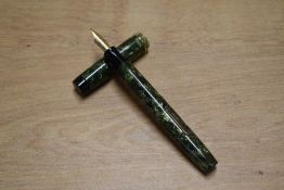 A Valentine 04 lever fill fountain pen in Green Lined with a single narrow cap band having a