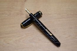 A boxed Conway Stewart 28 lever fill fountain pen in Black Cracked Ice with single narrow cap band