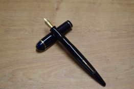 A Wahl Eversharp Skyline lever fill fountain pen in Dark Blue with single cap band having