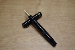 A Mabie Todd & Co Swan Leverless 1060 twist fill fountain pen in black with three narrow cap bands