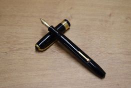 A Conway Stewart 27 lever fill fountain pen in Black with wide cap band having Conway Stewart 14CT