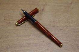 A Parker 180 cartridge fill fountain pen in Jasper Red Quartz
