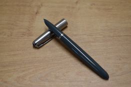 A boxed Parker 51 aerometric fill fountain pen and LL pencil set in Navy Grey with Lustraloy cap.