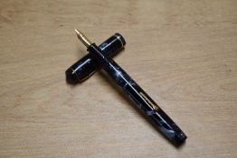 A Conway Stewart 286 leverfill fountain pen in Blue Marble with single narrow cap band having Conway
