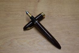 A Sheffer Lifetime 875 lever fill fountain pen in Brown having Sheaffer 14K Made in USA nib. Circa