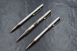 Three round Yard o led mechanical pencils. All hallmarked Silver, Birmingham 1974, London 1957 and