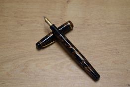 A Wyvern Perfect No8 lever fill fountain pen in Brown Marble with single cap band having Wyvern 14CT