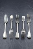 A group of five Victorian silver fiddle pattern forks, having 'P' initial to terminals, marks for