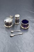 A cased George V silver cruet set, comprising salt, pepper and mustard, of circular form having