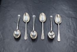 A cased set of six George V silver teaspoons, having thread decoration, marks for Birmingham 1929,