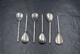 A cased set of Elizabeth II silver Keswick School of Industrial Arts teaspoons, having flattened