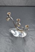 A Danish Mid-Century silver plated triple candlestick holder, the trio of sconces raised on a