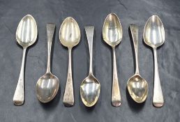 A set of eight Victorian silver fiddle pattern teaspoons, having heraldic crests to terminals, marks