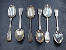 A group of three Victorian silver fiddle pattern teaspoons, having heraldic crests to terminals,