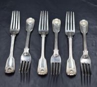 A group of six Victorian silver fiddle and shell pattern forks, having dog heraldic crests to