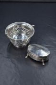 A late Edwardian silver trinket box, of oval form raised on four cabriole style legs, marks for