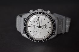 An Omega x Swatch Speedmaster Moonswatch, Mission to the Moonphase 1965 wristwatch, the white dial