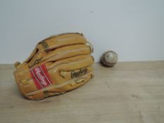 Rawlings RBG 36 Baseball Glove with Deep Well Pocket along with a leather baseball