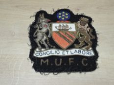 Manchester United Embroidered & Wirework Club Crest inscribed M.U.F.C. CONCILIO ET LABORE