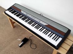 Korg SP-250 Digital Piano, comes with Korg sustain pedal. No power supply.