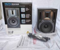 Behringer Truth B3030A Studio Reference Monitors and one Behringer Behritone C50A Reference Monitor