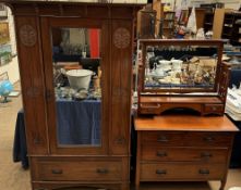 An Edwardian walnut wardrobe with a mirrored door and base drawer together with a walnut dressing