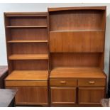A William Lawrence teak wall unit with drop down front,