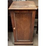 A Victorian mahogany pot cupboard with a square top above a single door and plinth base