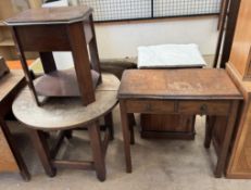 A mahogany sewing table together with a circular occasional table and a two drawer side table