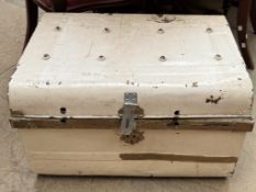 A cream painted tin trunk