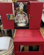 A cased empty bottle of Remy Martin Louis XIII,