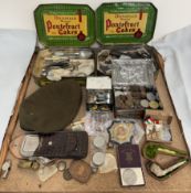 World War II medals together with cap badges, a rolls razor, electroplated cutlery,