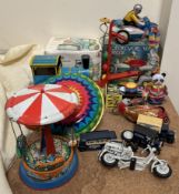 A Kovap tin plate steam roller together with a collection of tin plate toys including an elephant,