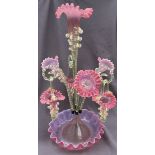 A pink and lemon glass epergne with a central trumpet three further trumpets,