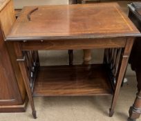 An Edwardian mahogany occasional table with a rectangular moulded top above four square tapering