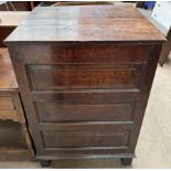 An 18th century and later oak coffer of square form with a planked top,