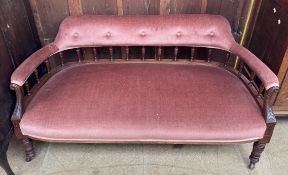 A Victorian three seater settee,